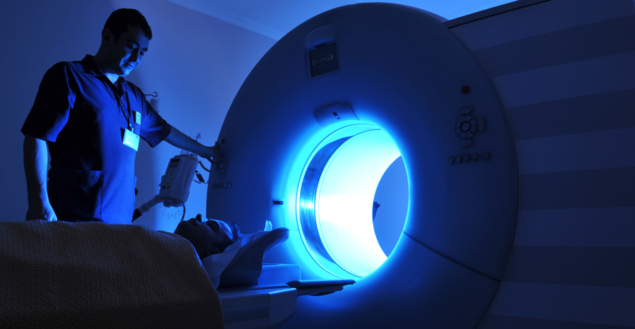 Medical dictation software - image of a healthcare professional using a scanner before creating a dictation